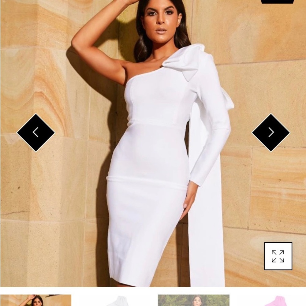 Asymmetrical one sleeve bodycon dress w/exposed gold zipper and bow on the back.